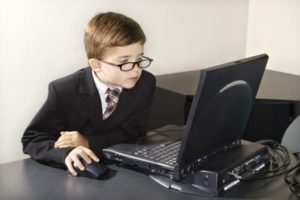 kid working on his laptop